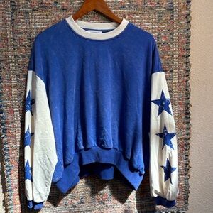 Eesome Blue Top with Cream Trim and stars ⭐️ no size marked but runs large.